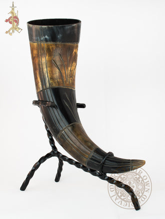 Drinking horn with black and brown colour and carvings
