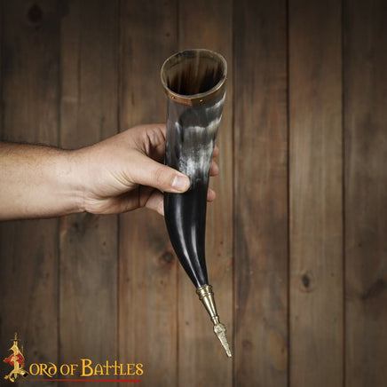 drinking horn with bird brass design