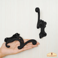 Solid cast iron hook with oil blackened effect