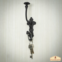 large oil blackened cast iron hook