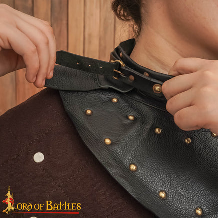 medieval brigandine gorget armour made from black leather and riveted steel plates