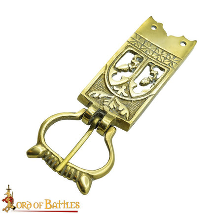 14th century belt buckle with acorn motif made from brass