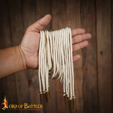 14th century clothing brass aglets on cords with white cord
