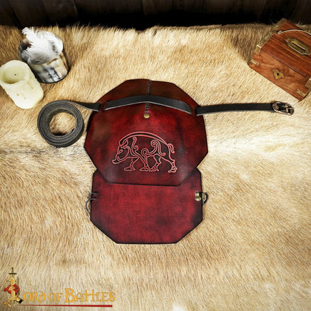Celtic shoulder armour made from red leather with boar design