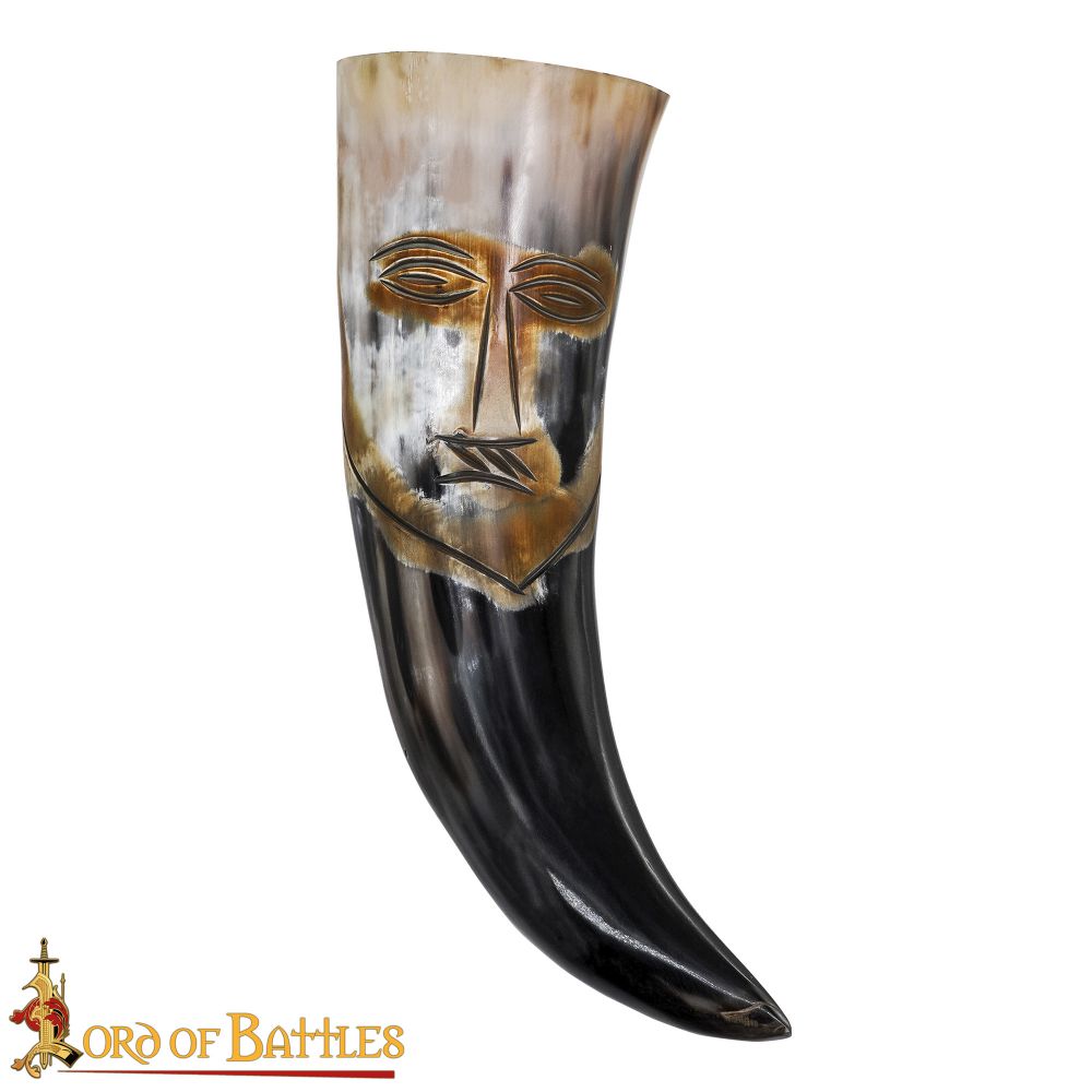Drinking horn with carved face