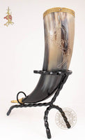 Drinking horn with carved horse design with brass trim and end