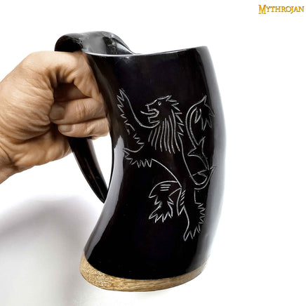 Horn tankard with rampant lion engraving and leather strap