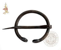 Viking blacksmith forged cloak dress pin or fibula for fastening cape or clothing