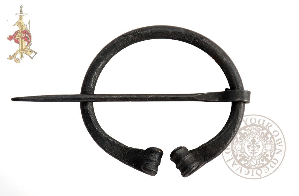 Viking blacksmith forged cloak dress pin or fibula for fastening costumes and clothing