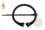 Viking blacksmith forged cloak dress pin or fibula for fastening costumes and clothing