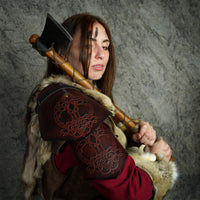 Viking armour made from brown leather with Mjölnir design