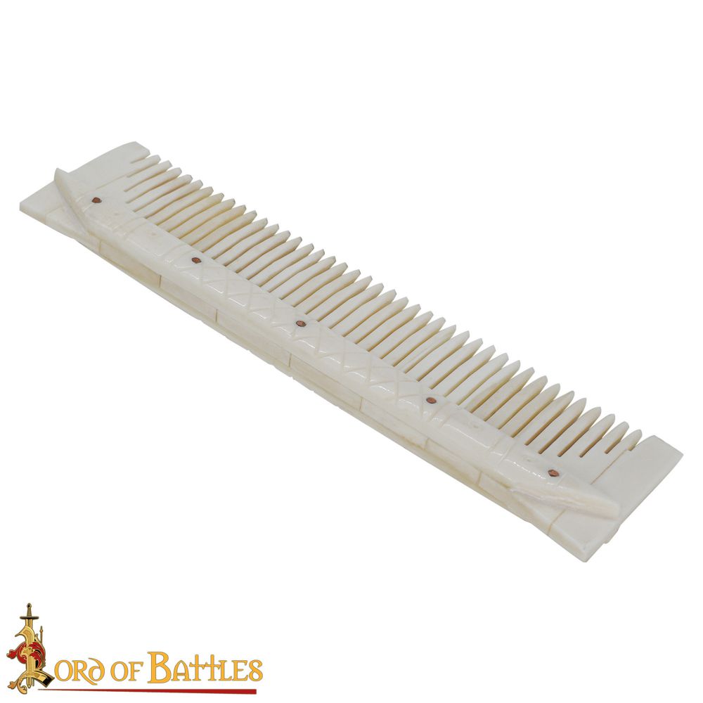 Viking comb made from bone with decorative carving