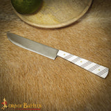 Viking kitchen and serving knife made from stainless steel with a carved bone handle