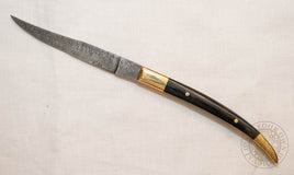 Viking damascus folding knife with horn and brass handle