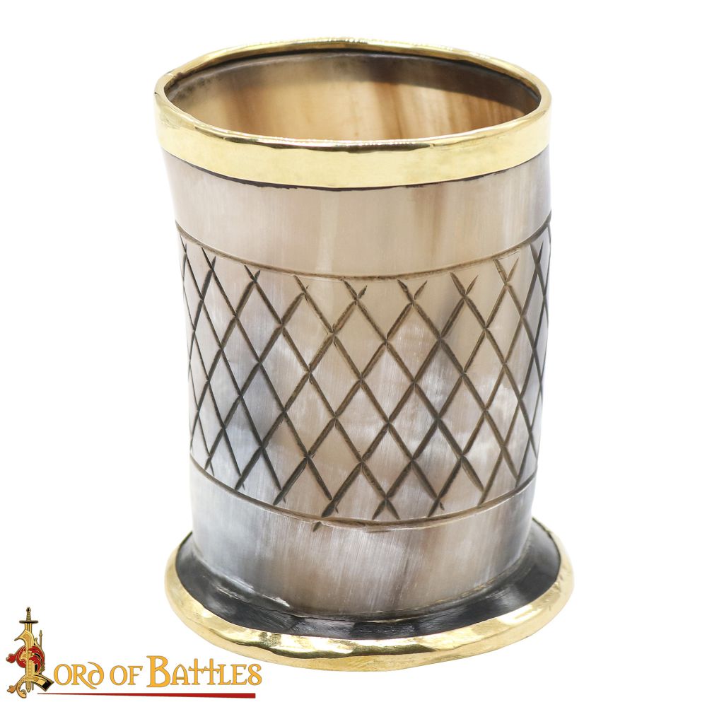 horn cup with decorative brass trim and engraving