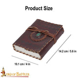 leather journal with stitched cover and decorative stone set in the centre