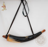 powder horn with leather strap and wooden stopper
