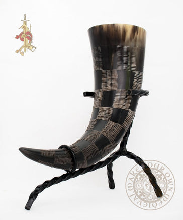 viking drinking horn with carved serpent scale